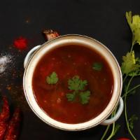 Rasam · Traditional South Indian spiced lentil & tomato essence soup.