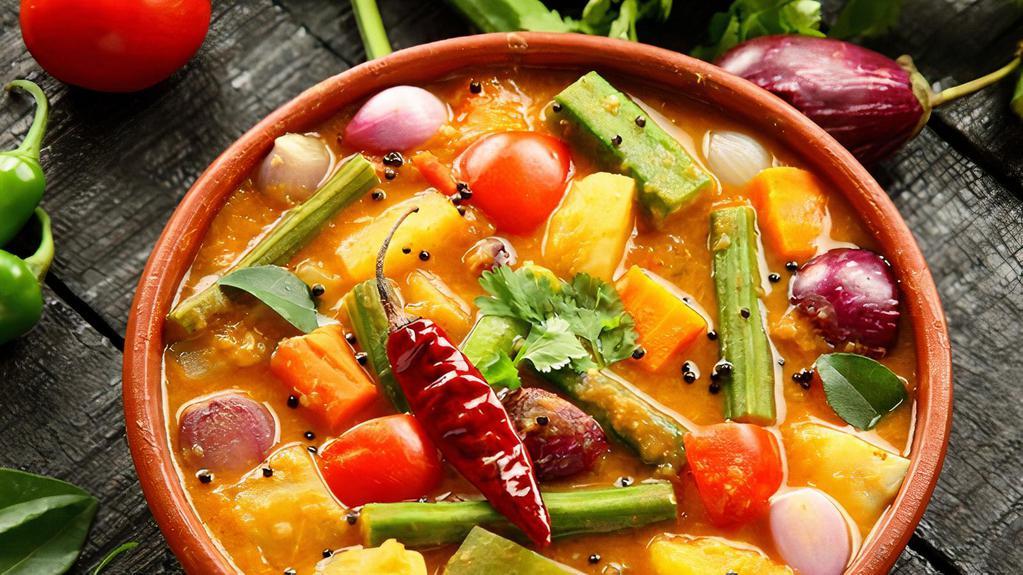 Sambar · Traditional lentil bean soup with Indian spices.