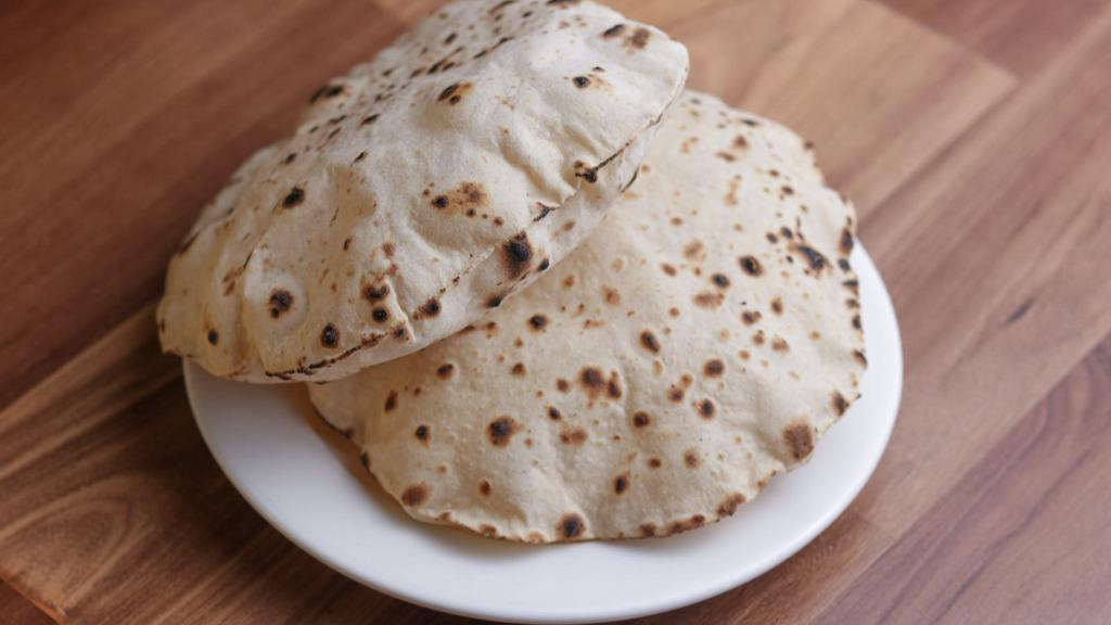 Chapati · Flat bread topped with oil.