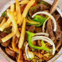 Mix Grill Platter · Marinated chicken, Lamb, Beef over basmati rice, all orders come with salad, pita bread, hom...