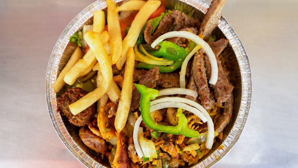 Mix Grill Platter · Marinated chicken, Lamb, Beef over basmati rice, all orders come with salad, pita bread, homemade side order of falafel, white Sauce,hot sauce, 
Most Popular. Served over rice and salad and served with sauce.