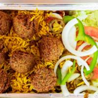 Falafel Over Rice · Vegetarian. Served with rice, salad, and french fries.