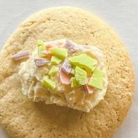 Rainbow Chip · Soft baked sugar cookie topped with rainbow chip frosting