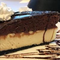 Chocolate Mousse Cake · A layer of New York Cheesecake, a layer of Chocolate Mousse covered in a Chocolate Ganache. ...