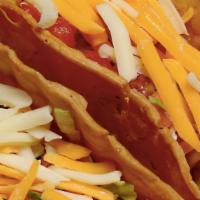 Vegan Crispy Tacos · Made with white rice, black beans, lettuce and pico de gallo.