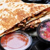 Steak Quesadilla · Made with Jack & cheddar cheese and grilled steak. Plated with sour cream, pico de gallo and...