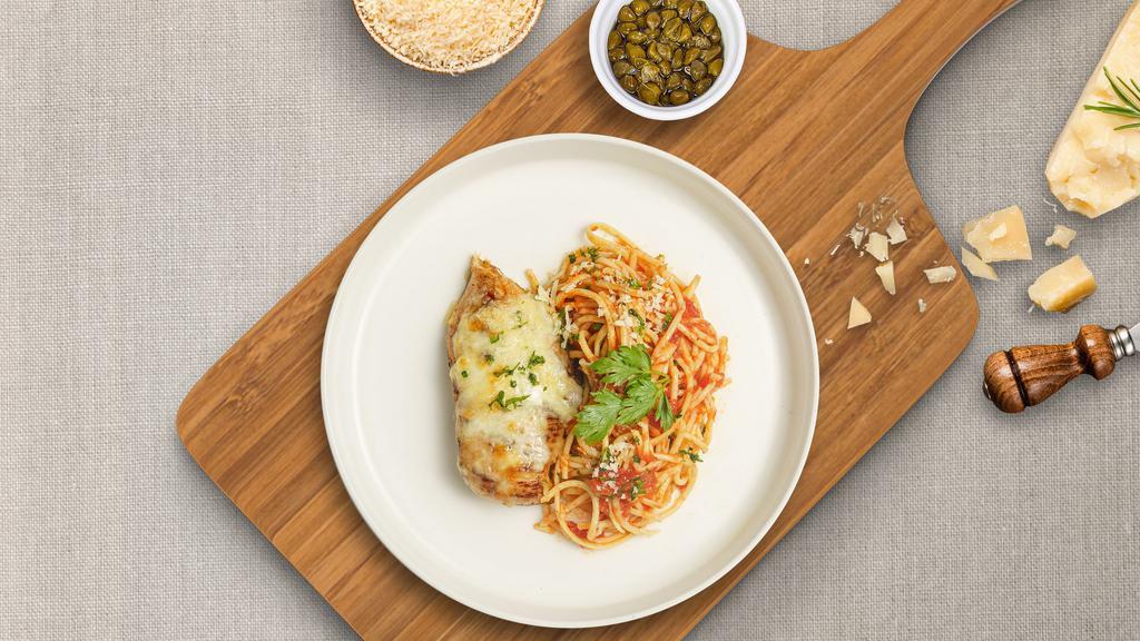Chicken Parm Entree · Freshly baked chicken parmesan served with rossa (red) sauce spaghetti and drizzled with parmesan cheese