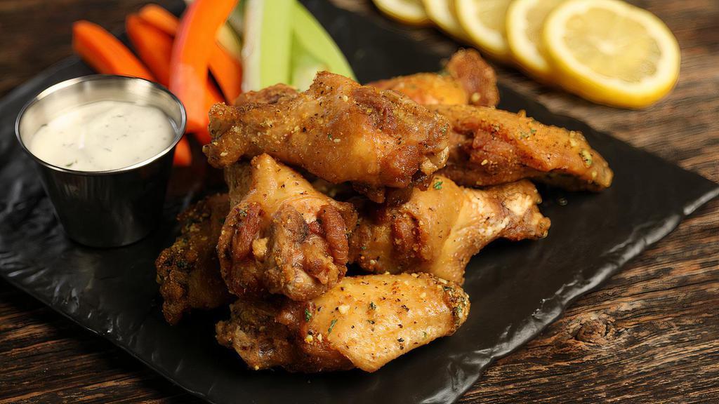 Lemon Pepper · 8 lemon pepper wings (mild heat), served with carrots & celery and a choice of blue cheese or ranch for dipping