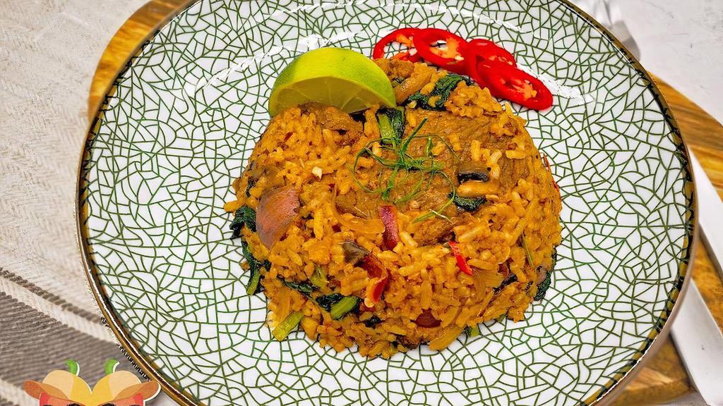 Tom Yum Fried Rice · Medium. Rice, egg, onion, kaffir lime leaves, lemongrass, soy sauce, sugar, chili jam, chopped scallion, cucumber, lime wedge.