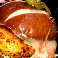 Bbq Chicken Melt · Griddled sandwich with grilled chicken, bacon, melted mozzarella and Swiss, cheeses, barbecu...