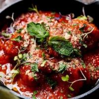 Meatballs · Minced beef, parsley, DOP-grade San Marzano tomato sauce, parmigiano, oregano, basil.