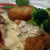 Pollo Cordon Bleu · Chicken rolled with provolone cheese, ham, breaded, fried to a golden brown, roasted garlic ...