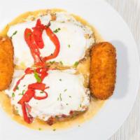 Chicken Sinatra · Battered francaise style, layered with eggplant, prosciutto, fresh mozzarella and roasted pe...