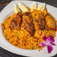 Arroz Con Pollo / Rice With Chicken · Pollo con arroz mezclado, ensalada mixta, plátano dulce y huevo. / Mixed rice with chicken, ...