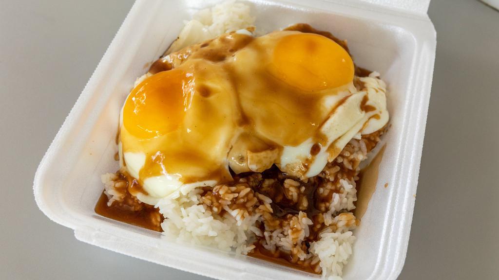 Loco Moco · 2 scoops of rice, 1 homemade Tatsuo’s hamburger patty, 2 eggs any style, with savory brown gravy.