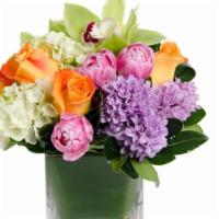 Chasing Rainbows  · Send a rainbow of colors today with this charming and lovely arrangement, perfect for celebr...