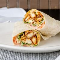 Buffalo Chicken Wrap · Our own buffalo chicken with lettuce, tomatoes and blue cheese dressing wrapped in a flour t...