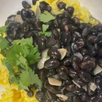Rice & Beans · your choice of yellow or cilantro rice served with black beans or refried beans