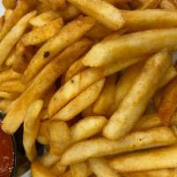 Seasoned Fries · served with ketchup