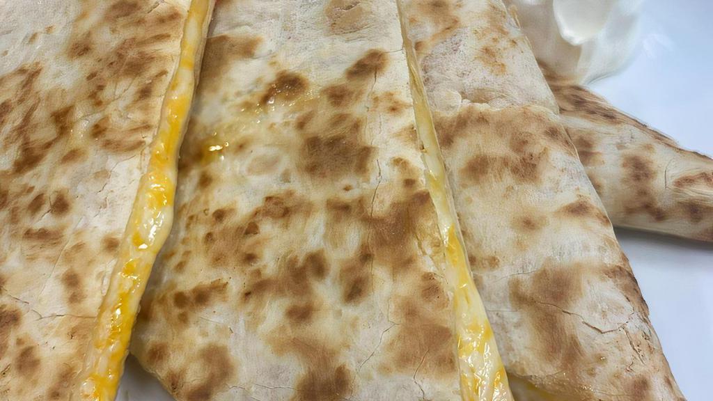 Cheese Quesadilla · served with chips nd sour cream