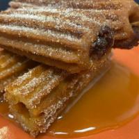 Stuffed Churros · filled with dulce de leche