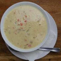 New England Clam Chowder · Oyster crackers.