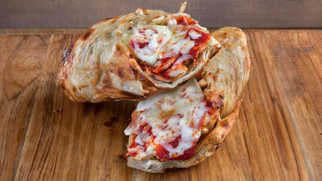 Chicken Parm Pastrino · Our Hot and Buttery Flat Croissant Wrapped Around Grilled Chicken Breast, Grandma’s Spicy Marinara Sauce, Melted Mozzarella and Parmesan Cheese.