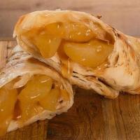 Apple Pie Pastrino · Our Hot and Buttery Flat Croissant Wrapped Around Caramelized Apples, Caramel and Cinnamon! ...