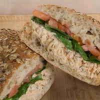 Poseidon Tuna Sandwich · The King of All Tuna Sandwiches! Our Homemade Tuna Recipe with Crispy Lettuce and Sliced Tom...