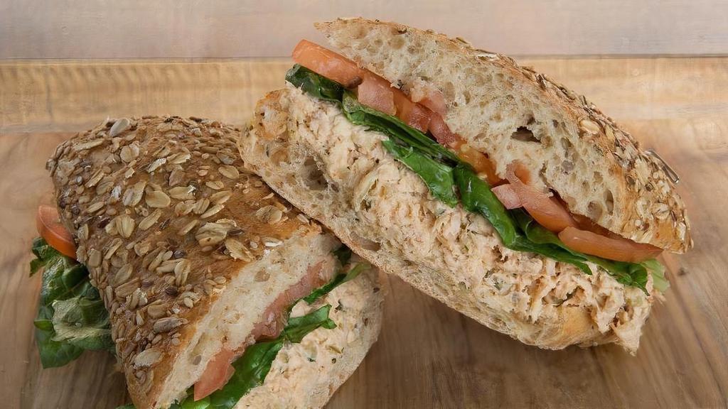Poseidon Tuna Sandwich · The King of All Tuna Sandwiches! Our Homemade Tuna Recipe with Crispy Lettuce and Sliced Tomatoes - Ciabatta or Multi Grain Bread.