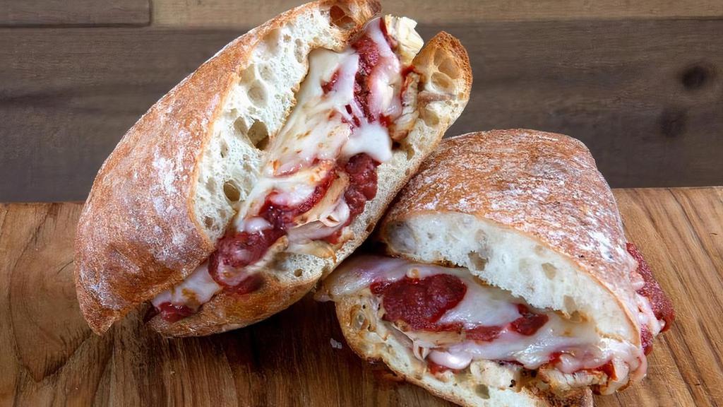 Chicken Parm Sandwich · Grilled Chicken Breast, Grandma’s Spicy Marinara Sauce, Topped with Melted Mozzarella and Parmesan Cheese. - Ciabatta or Multi Grain Bread.