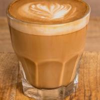 Cortado · Our rich and velvety espresso made with an equal part of perfectly steamed milk.