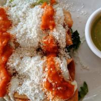 Cheese Flautitas · Crispy taquitos, stuffed with cheese topped with cotija cheese, salsa de árbol, served with ...