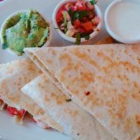 Shrimp Quesadilla · Marinated shrimps, onions, peppers, Oaxacan and cheddar cheese, served with guacamole, sour ...