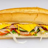 Traditional 30Cm · Ham, cheese, tomato, lettuce, mayonnaise. It is served hot.