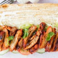 Chicken Tikka Sandwich · sautéed onions and peppers with fresh lettuce tomatoes and cucumbers