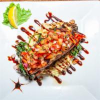 Salmon Tower · atlantic salmon on bed of mashed potatoes stacked with grilled portobello mushroom, sautéed ...