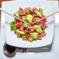 Tuna Poke Bowl · rare seared sesame crusted ahi tuna, edamame, carrots, cabbage, scallions, beets, avocado, c...
