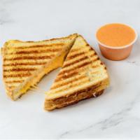 Grilled Cheese · *Hamotzi* American classic grilled cheese, served with tomato dipper.