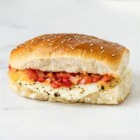 Sunnyside Sandwich · Breakfast Bread, Sunnyside Egg, with a choice of toppings.
