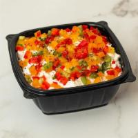 Cottage Cheese Bowl · bowl of cottage cheese, red pepper, orange pepper, yellow pepper, cucumber, salt & pepper.