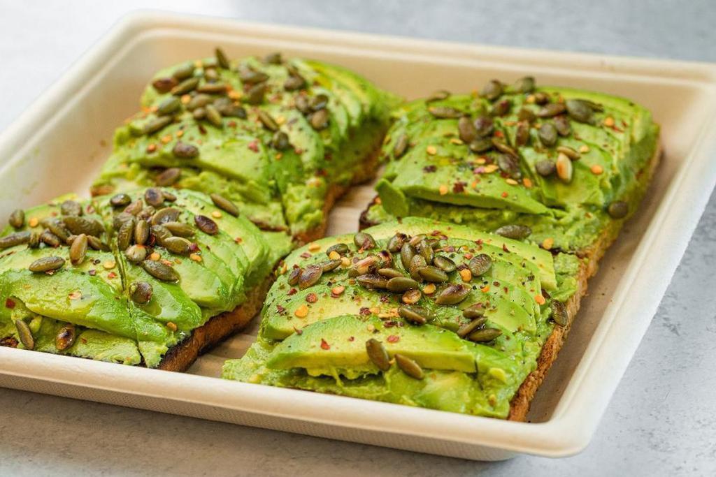 Avocado Toasts · Serves 4-6. *hamotzi* Toasted multigrain bread, Freshly sliced avocado on a layer of smashed avocado, topped with chili flakes, pumpkin seeds, olive oil, salt & pepper.
