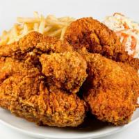 Four Pieces Mix · Breast, whole wing, thigh, and drumstick. Served with fries and coleslaw.