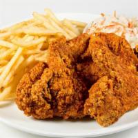 The Wing Supreme · Four whole wings. Served with fries and coleslaw.