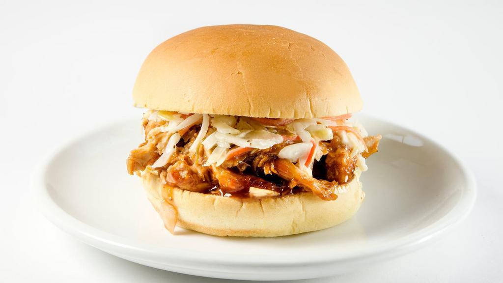 Bbq Pulled Chicken Sandwich · BBQ pulled chicken and coleslaw on a potato bun