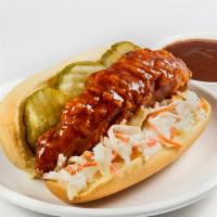 Bbq Dog · Crispy white meat chicken on a side split potato bun with BBQ sauce , cole slaw and pickles