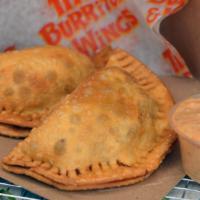 Ground Beef Empanadas. · Two empanadas served with housemade corn tortilla chips and spicy chipotle sauce.