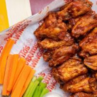 12 Wings. · 12 wings cooked to order. Served with celery and carrots with your choice of toss sauce and ...