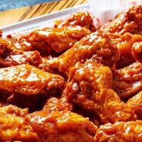 24 Wings. · 24 wings cooked to order. Served with celery and carrots with your choice of toss sauce and ...