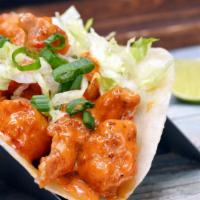 Bang-Bang Tempura Shrimp Taco. · Tempura shrimp, lettuce and spicy chipotle sauce